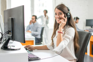 A smiling virtual receptionist takes legal intake calls for lawyers and their staff.